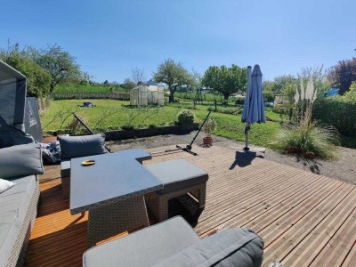 Doppelhaushälfte mit großem Garten in ruhiger Ortsrandlage