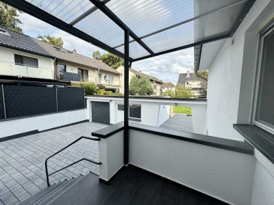 3-Zimmer Wohnung mit viel Nutzfläche, Garten, Garage und Stellplätzen im Zweifamilienhaus