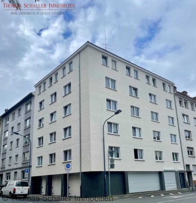 Gepflegtes Mehrfamilienhaus mit 15 Wohneinheiten, Gewerbeeinheit und Garagen in Top-Wohnlage