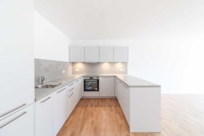 Elegantes Wohnambiente mit sonnigem Balkon und hochwertiger Einbauküche – Wohlfühloase für Anspruchs