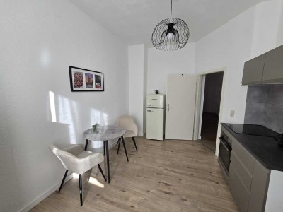 5 Minuten zu Roche Kernsanierte (möbliert) 1-Raum-EG-Wohnung mit Einbauküche