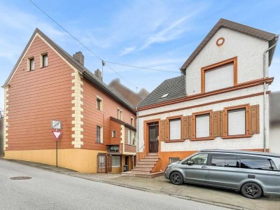 Zwei Immobilien mit großem Potential, 2 Garagen und großem Garten in Neunkirchen-Wiebelskirchen