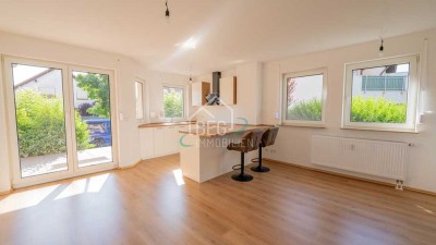 Modernisierte 2-Zimmer-EG-Wohnung mit Terrasse und Tiefgaragenstellplatz