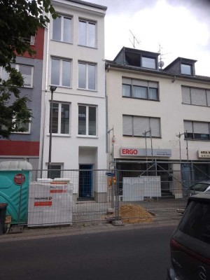 Neubauwohnung im Zweifamilienhaus in zentraler Lage