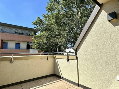 STUDIO-WOHNUNG mit Balkon! I Stellplatz in hauseigener Tiefgarage I hochwertige Einbauküche I Fußbodenheizung I bodenebenerdige Dusche I U1 ca. 13 min. mit Öffis