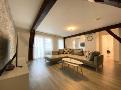Stilvolle und gemütliche 3-Zimmer-Wohnung mit Garage und Kellerraum in historisch zentraler Lage