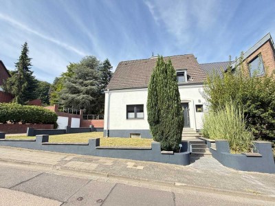 Familienidyll in Neuenhausen – modernisierte Doppelhaushälfte mit Garten & Garage
