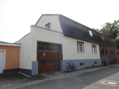Du suchst viel Wohnfläche mit einer großen Werkstatt und Grundstück? Dann bist du hier richtig!
