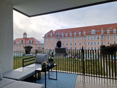 3-Zi.-Wohnung mit Balkon, Einbauküche und 
2 Tiefgaragenstellplätzen