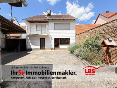 Einfamilienhaus mit Hof, großzügigem Garten, vielseitiger Werkstatt -Potenzial für kreative Nutzung