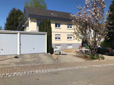 Helle 3-Zimmer-Dachgeschosswohnung mit Balkon, Garage und Garten