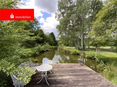 Familienhaus mit traumhaftem Grundstück samt eigenem Teich!