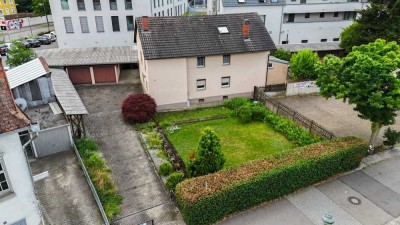 2-3 Familienhaus mit Wintergarten und Garagenkomplex
