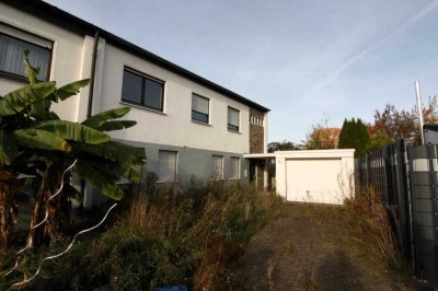 Ruhige Doppelhaushälfte mit Renovierungsbedarf in Unna zu verkaufen.