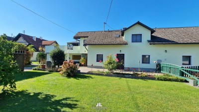 DEIN ZUHAUSE - Ein-/Zweifamilienhaus mit großem Garten und Pool in Attnang-Puchheim