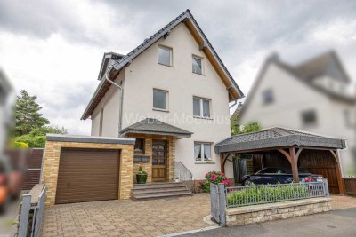 **Ein Haus mit Charme** und mit wunderschönem Garten in attraktiver Lage von Bergisch Gladbach