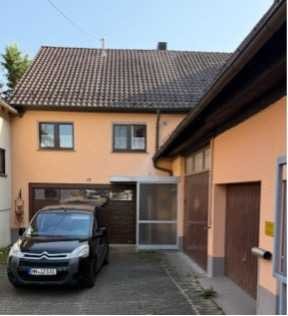 Einfamilienhaus  mit Werkstatt/Garage und Garten