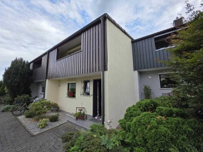 Lichtdurchflutetes Reihenhaus mit besonderer Architektur und offener Wohnkultur