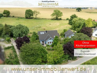 Mehr Raum für Leben - Großzügiges Holzschwedenhaus mit grünem Gartenparadies und Einliegerwohnung