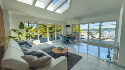Penthouse mit Seeblick & luxuriöser Einrichtung