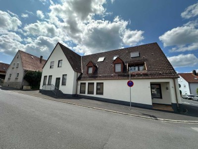 Attraktives Mehrfamilienhaus mit 4 Wohneinheiten & 2 Gewerbeeinheiten mit zusätzlichem Baugrundstück