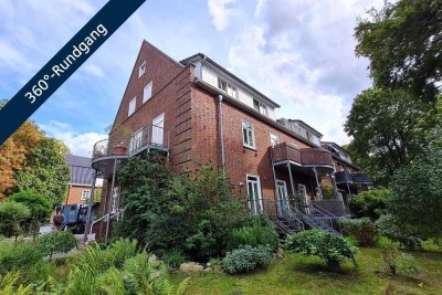 Großzügiges Wohngefühl mit Sonnenbalkon und Garten