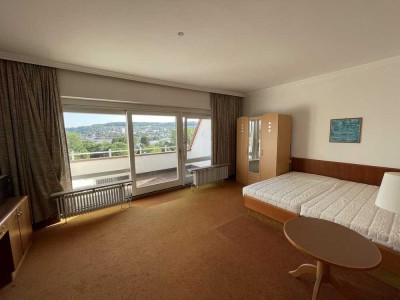 Möbliertes 1-Zimmer-Apartment mit Küchenzeile und Balkon