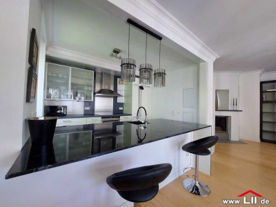 Modern möblierte 2 ZW mit Kamin, Südbalkon und TG-Stellplatz