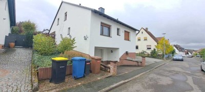 Großzügige Gartenwohnung auf zwei Ebenen mit Pool & Garage - Oberrodenbach