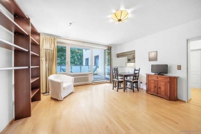 Ruhig Lage nahe BMW - Apartment mit großem Balkon, separater Küche und Duplexstellplatz.