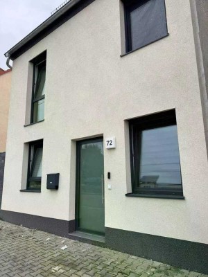 Neu und viel Platz: Wohnung mit Garten & Terrasse in Leuna