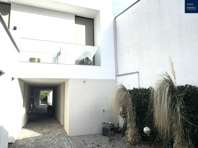 Privatsphäre &amp; Perfektion – Architektenvilla mit Garten, drei Terrassen &amp; Homeoffice