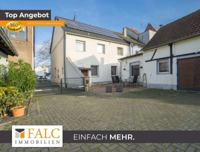 Zwei Familien, unzählige Möglichkeiten – Energieeffizientes Haus mit 3 Garagen & großem Innenhof!