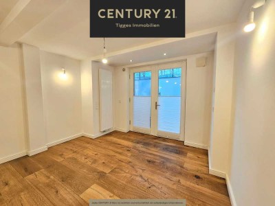 ** wesernahe & moderne Souterrainwohnung **