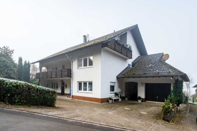 Solides 3-Familienhaus in ruhiger, naturnaher Lage, freut sich auf Sie!