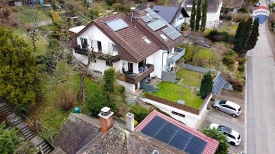 Doppel-
haushälfte mit Einliegerwohnung und Doppelgarage!