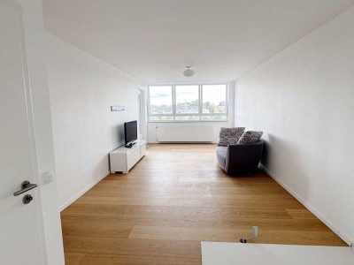 Helle 2-Zimmer-Wohnung mit Loggia und Ausblick – mitten in Monheim