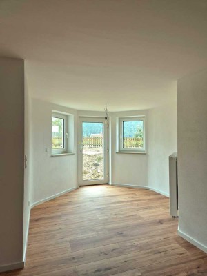 Traumhafte 2-Zimmer-Wohnung mit Garten und Stellplatz | Erstbezug nach Kernsanierung