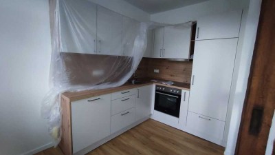 Charmante, neuwertige 2-Zimmer-Wohnung mit Fachwerkflair, Stellplatz und Gartennutzung