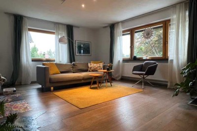 Attraktive 3-Zimmerwohnung  -
in Zweifamilienhaus mit Wintergarten, Terrasse und Gartenanteil