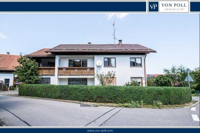 Geräumiges Haus mit Carport, Garage und zwei Wohnungen in zentraler Lage