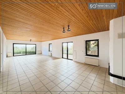 Sonniges 1,5-Zimmer-Apartment mit Kamin und Fernblick in Hanglage