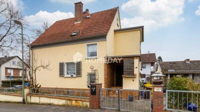 Einfamilienhaus mit Wintergarten, Garage und großem Garten in ruhiger Lage