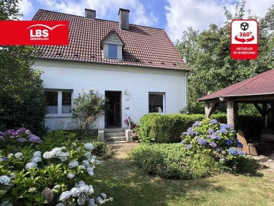 Charmantes Einfamilienhaus mit großem Garten in ruhiger Lage