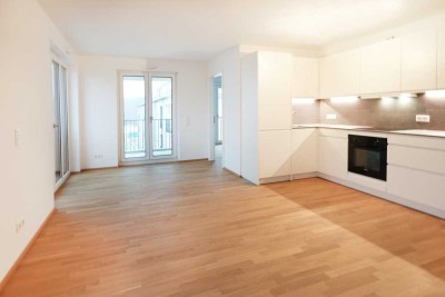 *Helle Neubau-2-Zimmer-Wohnung mit EBK, Balkon & PKW-Stellplatz am Schlosspark zum Erstbezug!*