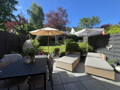 Modernes Reihenmittelhaus mit großer Terrasse und lauschigen Gartenbereich