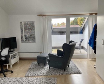 Stilvoll möbliertes Appartement (ca. 40 m²) mit Dachterrasse und Stellplatz in ruhiger Lage