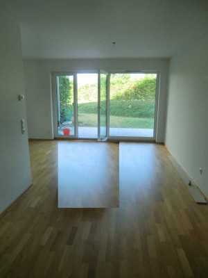 Lebensgefühl pur - Außergewöhnliche EG-Whg mit Terrasse, Garten und TG umgeben von Grünflächen