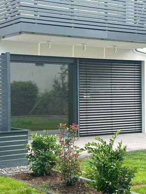 Neubau-Rarität in Bestlage: Wohngenuss mit Garten und Einzelgarage