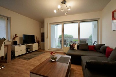 Taunusstein-Wehen: Vermietete 2-Zimmer-Wohnung mit Balkon, Gartenanteil & Tiefgarage